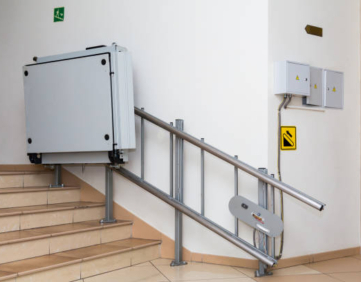Stair lift for the disabled. Stairs of public building.